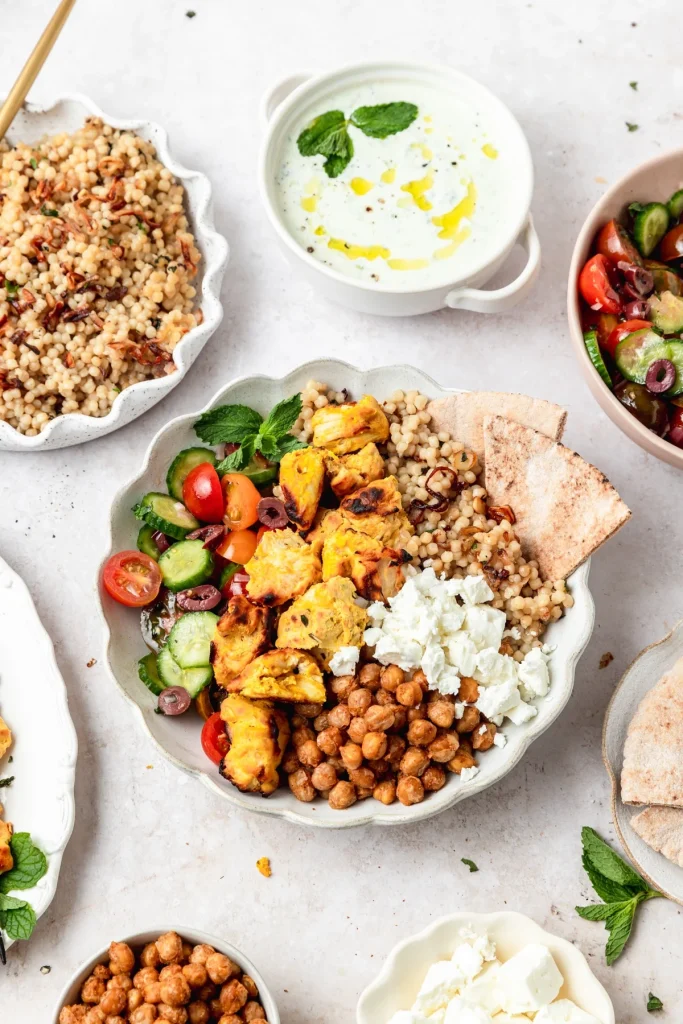 Greek Chicken Bowls with Toasted Pearl Couscous