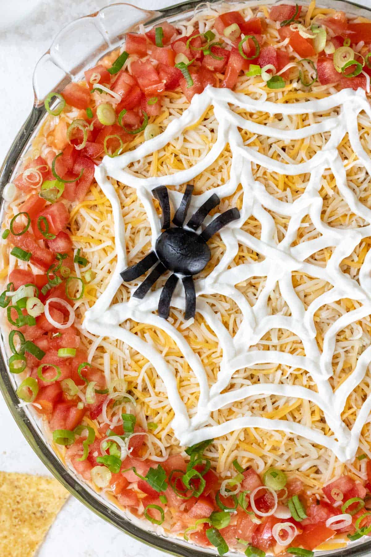 7 Layer Halloween Taco Dip (with Edible Spider and Spiderweb!)