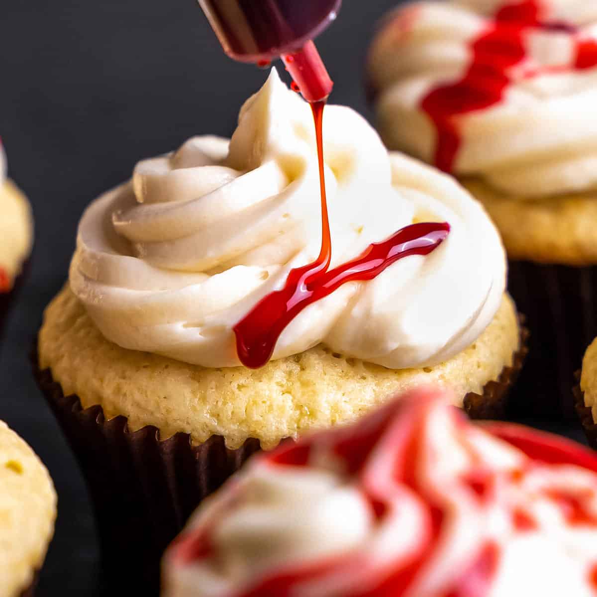 Bloody Vanilla Cupcakes with Edible "Blood"