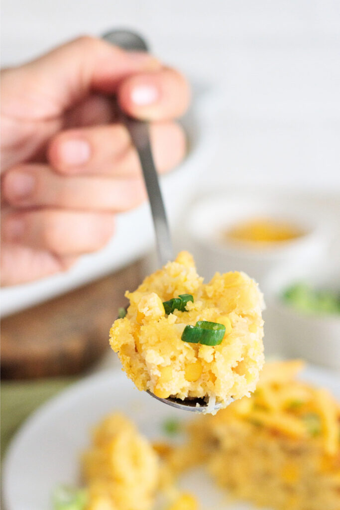 A spoon of Creamy Jalapeno Corn Casserole